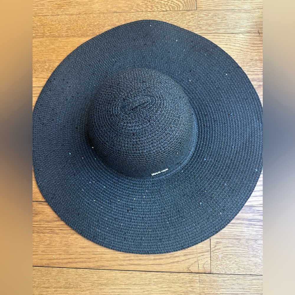 Brand new Calvin Klein hat with sparkles on rim never worn